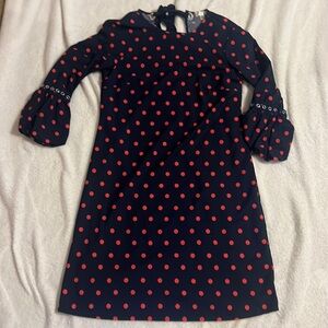 Navy blue dress with coral polka dots